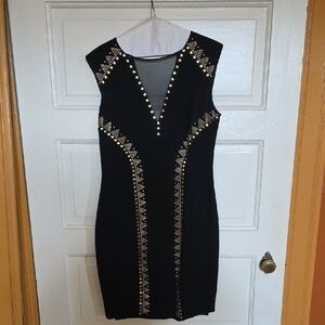 Chic Black Dress with Gold Detailing